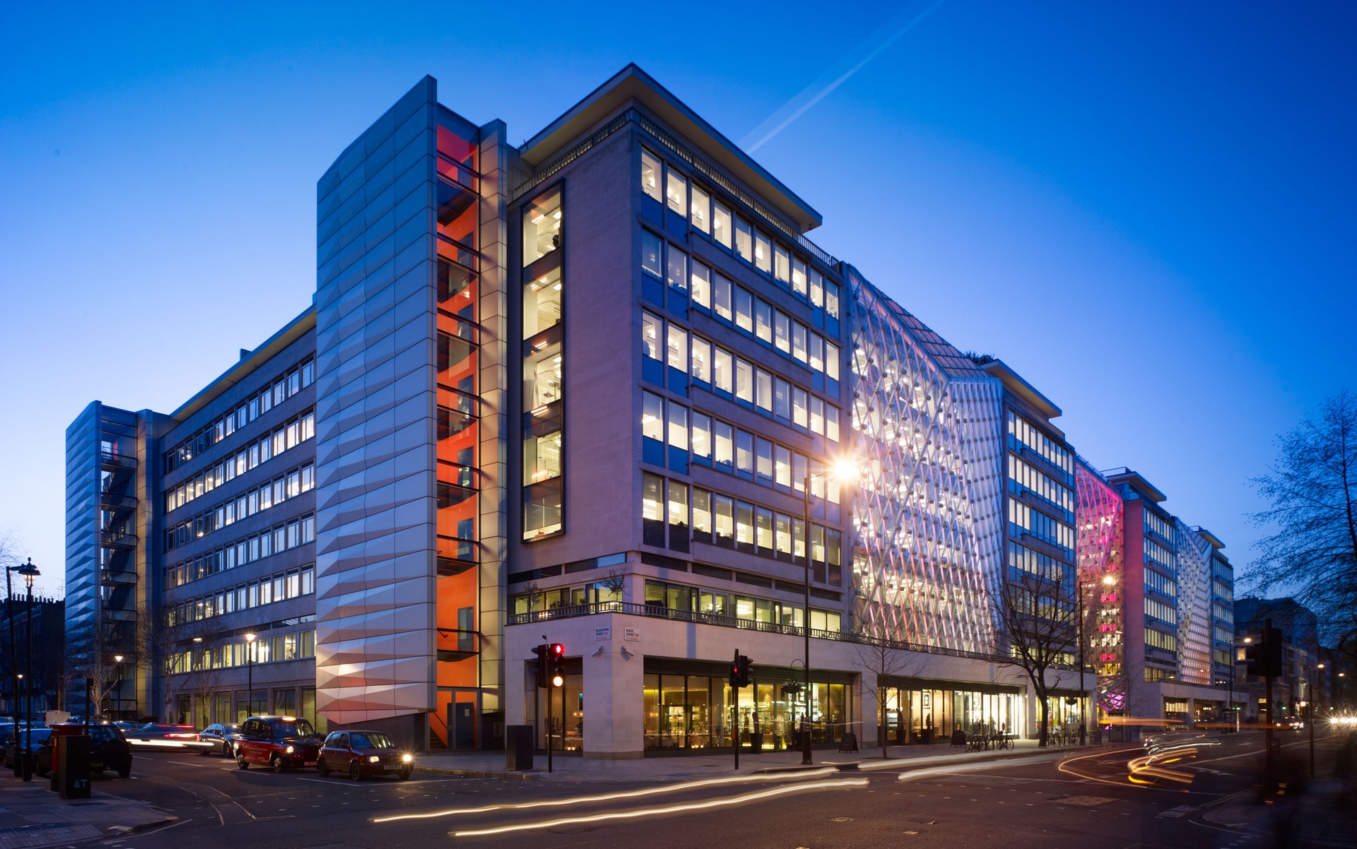 Outside of a building lit up at night