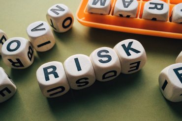 Risk spelt out on white blocks 