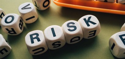 Risk spelt out on white blocks 
